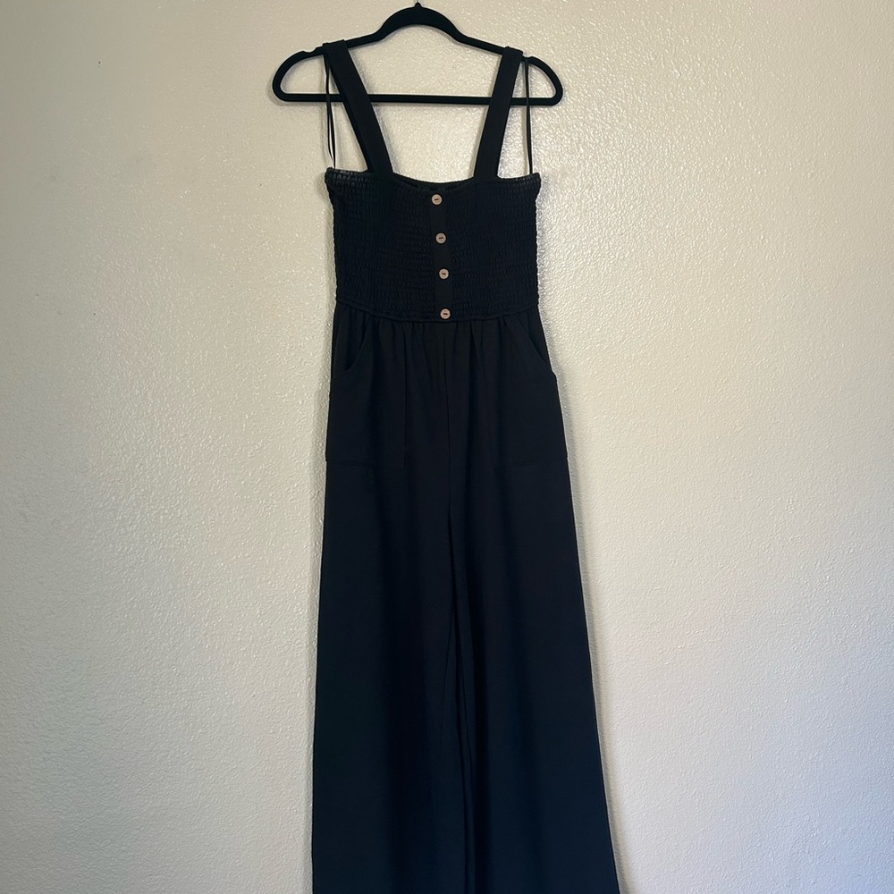 Black Sleeveless Jumpsuit with Button Detail